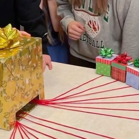 Benson Bros on Instagram: "Christmas Present String Pull Game! 🎁 #games #familygames #christmas #familygamenight #christmasparty #reels #partygames #tablegames" Present String Pull Game, Pull The String Christmas Game, Pull A String Challenge Game, String Pull Game, Benson Brothers Christmas Games, Benson Bros Games, Christmas Present Games, Benson Bros, Gift Games