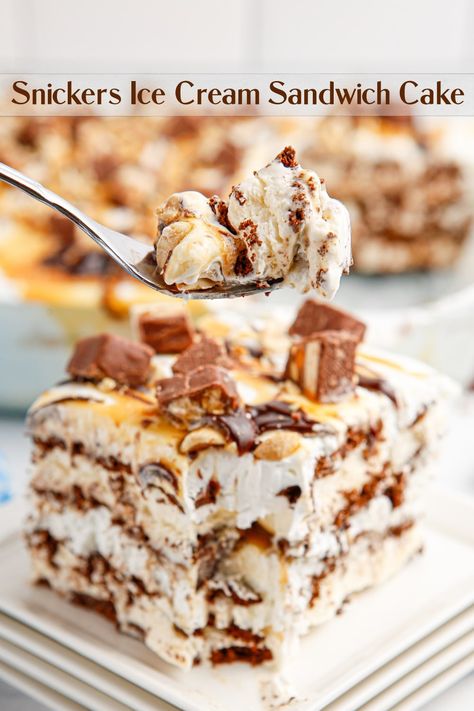 Easy and impressive, this indulgent Snickers Ice Cream Sandwich Cake is ready to serve at your next celebration. Layers of ice cream sandwiches and whipped topping create the base of this decadently, delicious treat.  via @cmpollak1 Snickers Ice Cream Cake, Ice Cream Sandwich Bar, Ice Cream Sandwich Dessert, Ice Cream Dessert Recipe, Cream Sandwich Cake, Snickers Ice Cream, Easy Ice Cream Cake, Ice Cream Sandwiches Recipe, Dessert Waffles