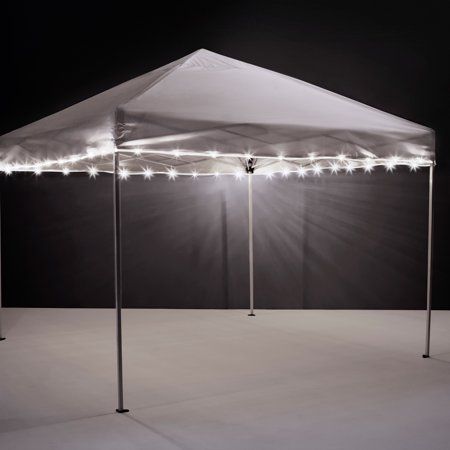 Enjoy your nights under the lights! Get your team spirit in high gear or set the mood for your cookout by lighting your tailgate canopy or patio umbrella. With 40 feet of lights that can be cut to size, there's plenty to fit a variety of canopy and umbrella sizes. These weather resistant lights come with clips to set them up and run on standard AA batteries (not included). We are dedicated to give everyone the very best houseware products for all home needs, with a focus on dependability, our cl Outdoor Umbrella Lights, Patio Umbrella Lights, Canopy Tent Outdoor, Umbrella Lights, White Canopy, Tent Lighting, Light String, Outdoor Tent, Led Outdoor Lighting