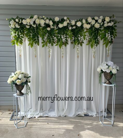 White Backdrop With Greenery, White Backdrop With Flowers, White And Green Stage Decoration, 50th Birthday Party Backdrop Ideas, Simple Flower Backdrop, Green Backdrop With Flowers, Green And White Backdrop, Backdrop Wedding Simple, Simple Backdrop