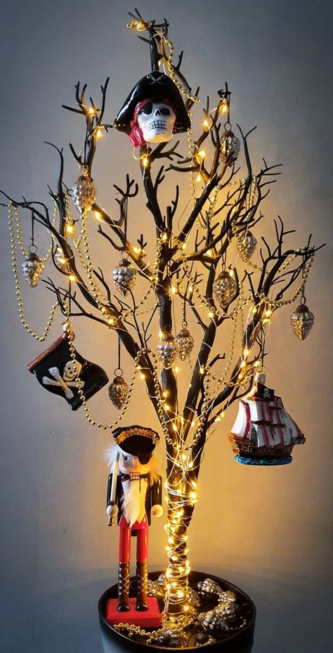 #ChristmasDecor #ChristmasTree #AlternativeChristmas #DarkChristmas #Pirates #DarkDecor #Pirate #Pirates #Gold #Skulls #RockandRoll #Decor https://www.instagram.com/p/CIO1Wi6jym-/?igshid=15lrh3aembrqr Pirate Christmas Tree, Pirate Christmas, Pirates Gold, Alternative Christmas, Dark Christmas, Tropical Christmas, Pirate Birthday, Pirate Skull, Pirate Theme