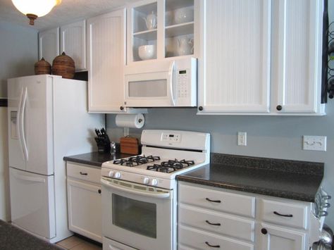 Matching Whites in a Mostly White Kitchen / HomeStagingBloomingtonIL White Kitchen Appliances, White Appliances, Fabric Drawers, Clothes Storage, Trendy Kitchen, Kitchen Paint, White Kitchen Cabinets, Painting Kitchen Cabinets, Kitchen Makeover