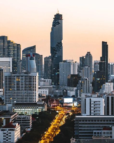 Resembling an imaginative Lego creation that was dropped right into the Bangkok skyline, the cleverly designed MahaNakhon building was… Bangkok Skyline, Bangkok Tourist, Thailand Travel Destinations, Travel Mood, Get Paid To Travel, Paid To Travel, Bangkok City, Bangkok Travel, Destination Voyage