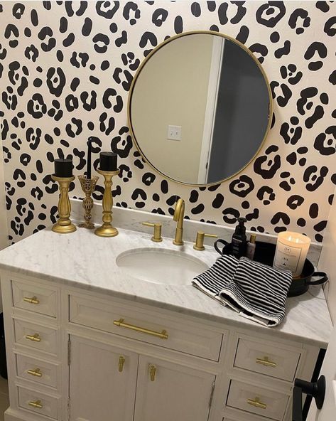 Carter + Main on Instagram: “How chic is the bathroom?! 🖤 Featuring our Dorinda Cheetah Spots pattern! . . . #wallpaper #removablewallpaper #peelandstickwallpaper…” Gold Theme Bathroom, Cheetah Bathroom, Half Bathroom Wallpaper Ideas, Leopard Bathroom Decor, Cheetah Bedroom, Leopard Bathroom, Half Bathroom Wallpaper, Animal Print Bedroom, Theme Bathroom