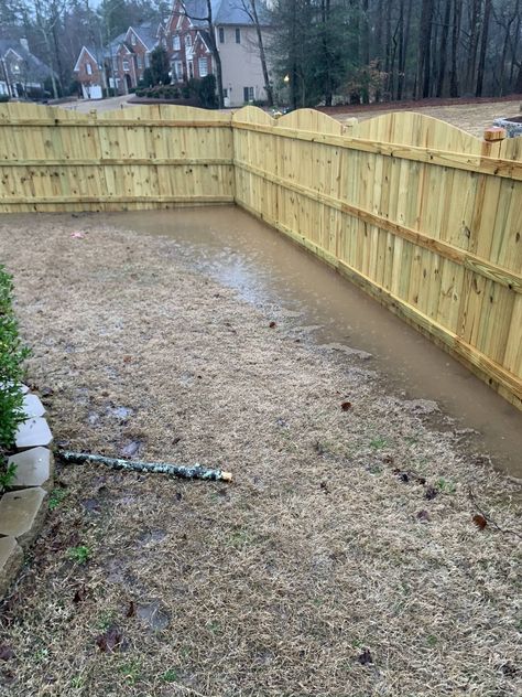 Fence Line Drainage, Fence Drainage Ideas, Rocks Around Fence Line, French Drain Along Fence, Drainage Along Fence Line, Dry Creek Bed Along Fence, French Drain Dry Creek Bed, Drainage Rock Landscaping, Drainage Rocks Around House