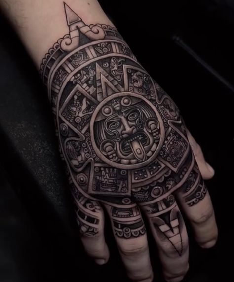 Aztec Calendar hand tattoo Aztec Filler Tattoo, Tattoo Ideas Aztec Mexican, Aztec Hand Tattoos For Guys, Mayan Hand Tattoo, Aztec God Tattoo For Men, Aztec Tattoo Ideas For Men, Aztec Calendar Tattoo Design, Mexican Tattoo Ideas For Men Sleeve, Aztec Tattoo Mexican Men