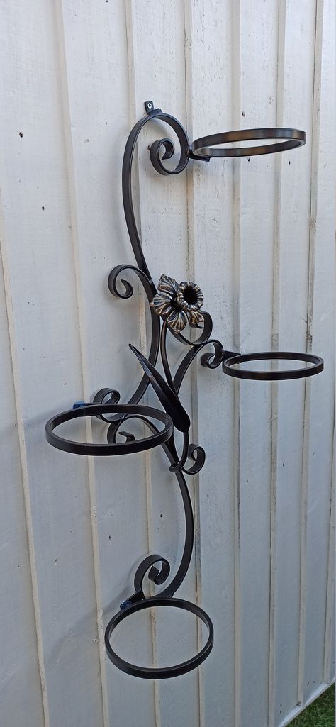 Wrought Iron Security Doors, Metal Flowers Garden, Iron Security Doors, Planter Indoor, Plant Pot Holders, Flower Pot Holder, Outdoor Pots, Garden Ornament, Metal Planters