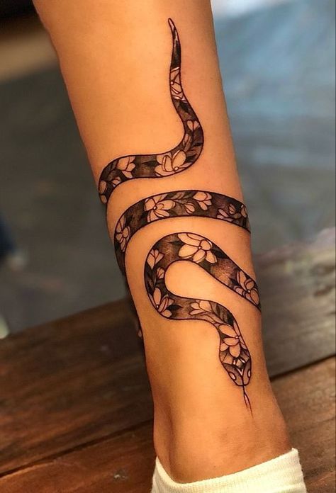 Snake tattoos can mean so much more than you ever imagined. But we are ready to reveal the truth about them and share the most incredible tattoo designs with you. Snake Wrap Around Ankle Tattoo, Snake Tattoo Ankle Wrap, Snake Shin Tattoo Women, Snake Foot Tattoos For Women, Leg Snake Tattoos Women, Wrap Around Snake Tattoo Leg, Snake Wrapped Around Ankle Tattoo, Snake Around Ankle Tattoo, Snakes Wrapped Around Arm Tattoo