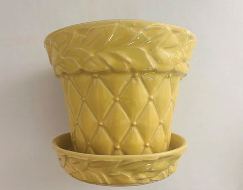 "chic yellow McCoy pottery planter quilted pattern with leaf border saucer integral to pot built-in drainage hole bottom reads McCoy USA 5\" x 6\" x 4 3/4\" in good vintage condition : crazing" Yellow Pottery, Yellow Planter, Metal Cow, Yellow Bamboo, Collectible Pottery, Yellow Quilts, Old Pottery, Hull Pottery, Modern Pottery