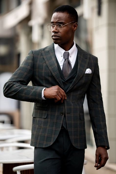 Stand tall in sharp, plaid perfection. The slim-fit cut of this green plaid suit hugs your frame, while the bold pattern gives your look a vibrant edge. A suit for those who are unapologetically stylish.

#greenplaid #slimfitsuit #boldstyle #modernmenswear #statementlook #plaidfashion #standoutinstyle #vibrantmenswear #menssuits #elevatedstyle Checkered Suit, Bow Tie Suit, Modern Fit Suit, Suit Styles, Plaid Material, Suit Stores, Vest And Pants, Slim Fit Suit Men, Lapel Jacket