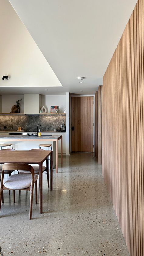 Polished concrete floors and timber feature wall Polished Concrete Floor Kitchen, Concrete Shed, Concrete Floor Kitchen, White Concrete Floors, Concrete Floors Living Room, Concrete Kitchen Floor, Polished Concrete Kitchen, Concrete Floors In House, Painting Floors