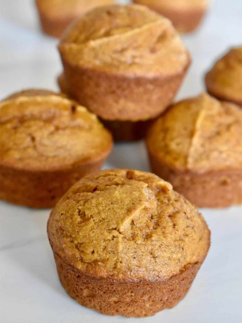 Pumpkin Applesauce Muffins are a deliciously moist and lightened-up muffin recipe made with canned pumpkin, applesauce, and cinnamon. Ready in just 20 minutes! Pumpkin Applesauce Muffins, Pumpkin Applesauce, Pumpkin Sweets, Moist Pumpkin Muffins, Mini Chocolate Chip Muffins, Gluten Free Pumpkin Spice, Applesauce Recipe, Autumn Baking, Applesauce Muffins