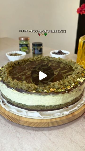 EatOutCyprus on Instagram: "DUBAI CHOCOLATE CHEESECAKE🍫✨💚

For the chocolate ganache: 
300 gr chocolate
40 gr unsalted butter (optional see tip below)

For the base: 
500 gr kataifi pastry
125gr unsalted butter
300gr pistachio cream @alphamegacy 

For the cream: 
600 gr cream cheese 
200 ml whipping cream
200 gr melted white chocolate 
2 tbsp icing sugar 
250 gr pistachio cream
(Let it cool in the fridge for at least an hour)

For the decoration: 
50 gr crushed pistachios 
50 gr pistachio cream 
leftover kataifi base 

Tip: Butter will turn the ganache rich and shiny but also turn the liquid stiff. To fix the seized chocolate, add a splash of whole milk or whipping cream and whisk for a minute. This will help and give a more melt in the mouth texture ⭐️

#recipe #dubaichocolate #cheeseca Dubai Cheesecake Recipe, Dubai Chocolate Cheesecake, Dubai Chocolate Cake, Chocolate Cheesecake Decoration, Pistachio Cheesecake Recipe, Dubai Cake, Kataifi Pastry, Crushed Pistachios, Cheesecake Decoration