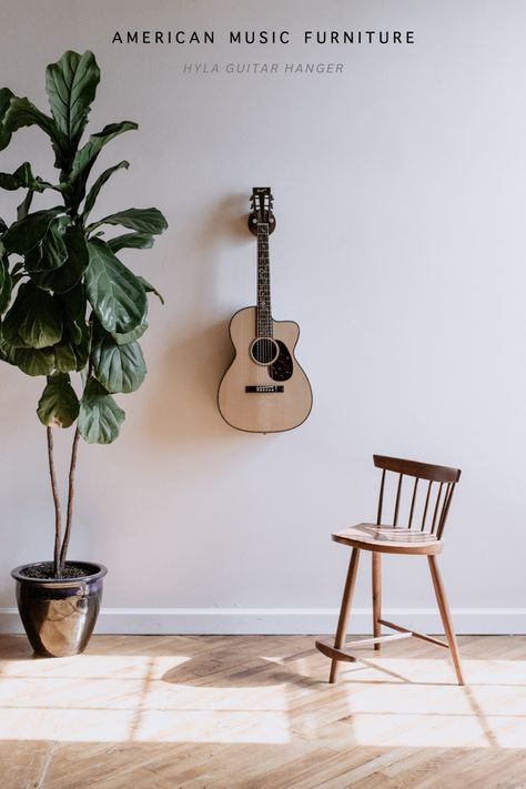 music room interior design furniture Music Room Display, Guitar Wall Stand, Hangout Room Ideas, Hanging Guitars, Guitar Display Case, Wooden Guitar Stand, Music Furniture, Vintage Instruments, Music Room Design