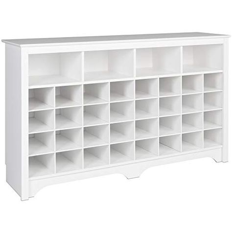 PRICES MAY VARY. Finish: White Thirty-two storage cubbies are spacious enough to hold a pair of size 13 men's shoes Four large upper cubbies for baskets, games, books Side and top moldings Decorative kicker The Trent Home 60" shoe cubby console is a great option for organizing an entryway, mudroom or family room. There are 32 shoe cubbies to keep shoes from cluttering your floors and four large top compartments to stow books, bags and catch-all baskets. Not just for shoes, the cubbies can also b Shoe Cubby Bench, Shoe Cubbies, Cubby Bench, Shoe Cubby, White Console Table, Entryway Mudroom, Wooden Shoe, Cubby Storage, Entertainment Furniture