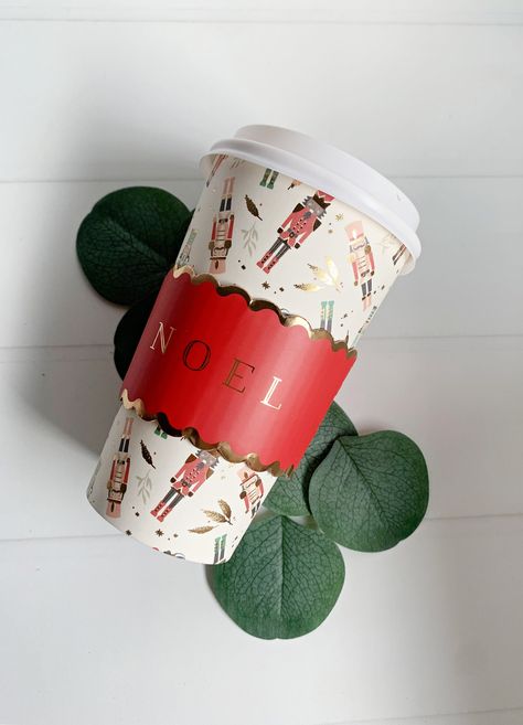 Elevate Your Coffee Moments with these Nutcracker Coffee Cups. Why go to a fancy coffee shop when you can delight your guests or savor a cup of cheer right in the comfort of your own home with our beautifully designed coffee cups? Whether you're looking for the ideal cup to adorn your hot cocoa bar, a charming cup for your guests to carry, or simply want to relish a warm cup of coffee in your kitchen, our sets of 8 Nutcracker Coffee Cups are the perfect way to celebrate the season! Product Highl Winter Baby Birthday Party, Winter Baby Birthday, Christmas Sweet Table, Hot Cocoa Bar Christmas, Christmas Hot Chocolate Bar, Food And Desserts, Paper Cup Design, Holiday Napkins, Cup Of Cheer