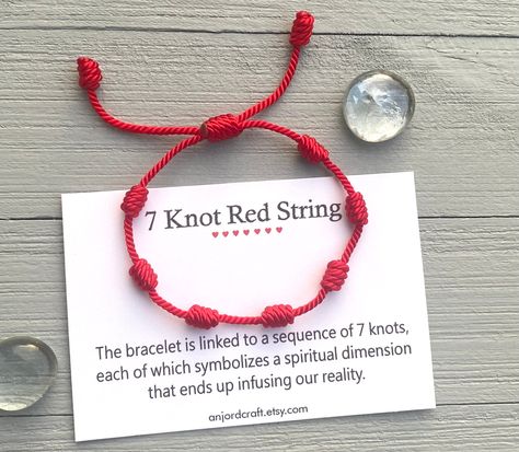 The bracelet is linked to a sequence of seven knots, each of which symbolizes a spiritual dimension that ends infusing our reality. It is also believed that the red string helps to channel positive energy for good luck and provide protection against evil. Bracelet Features: (1) 1.5mm Durable Twisted Nylon Cord (2) Bracelet is adjustable to fit most wrist sizes (3) Bracelet thickness (width) is 1.5mm (4) Please contact me if you need clarification Red String Of Fate Bracelet, Nutcracker Watercolor, Evil Bracelet, 26th Wedding Anniversary, Red String Of Fate, Kabbalah Bracelet, Spiritual Dimensions, Bracelet Evil Eye, Good Luck Bracelet