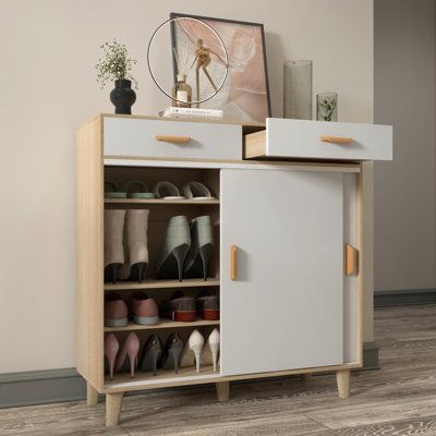 This versatile shoe cabinet complements almost any style of decor. It has classic finishes and clean lines. The handle door slides open to reveal a spacious interior. Adjustable shelves effectively store shoes of many sizes. The multi-purpose locker has 4 shelves on the left and right, in addition to helping you deal with clutter at the entrance, it can also store toys, books, games, and even clothes. Drawers and sliding doors use metal slide rails for smoother use. Measuring 39.4"H X 39.4"W X 1 Shoe Storage Cupboard, Space Saving Shoe Rack, Small Storage Cabinet, Shoe Cupboard, Small Cupboard, Small House Elevation Design, Shoes Storage, Shoe Shelves, Accessories Making