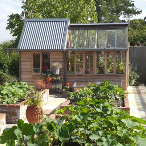 If you need a greenhouse and a storage shed but don't have the space and budget for two structures, the Gabriel Ash Rosemoor Combi will come to the rescue. Is it a shed with a greenhouse attached, or a greenhouse with an added shed? Either way, greenhouse sheds made of natural red cedar wood are convenient and look great. The Rosemoor Greenhouse Shed Combo uses tempered glass side panels and a mix of glass and corrugated aluminum roofing for an optically clear, well-protected structure. It has a Serre Diy, Diy Greenhouse Plans, Jardim Diy, Greenhouse Design, Greenhouse Shed, Home Greenhouse, Wooden Greenhouses, Backyard Greenhouse, Small Greenhouse