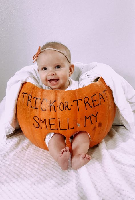 My First Halloween Pumpkin Painting, 1st Halloween Pumpkin Painting, One Year Old Halloween Pictures, Pumpkin With Pacifier, First Halloween Picture Ideas, Trick Or Treat Smell My Feet Pumpkin, Halloween Theme Newborn Photos, Baby’s First Halloween Pumpkin Carving, Baby Pumkins Ideas