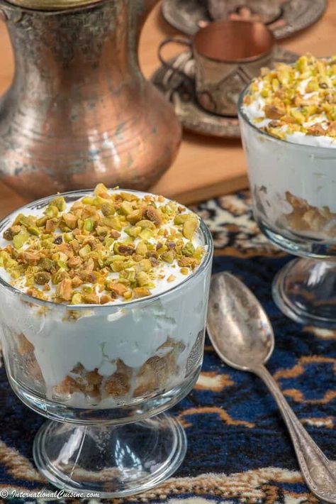 A sweet creamy dessert topped with pistachio nuts called esh asaraya, you will love this recipe from Qatar. Recipes From Qatar, Saudi Dessert, Qatar Recipes, Qatar Food, Karak Tea, 21 November, Global Food, Ethnic Food, Popular Desserts