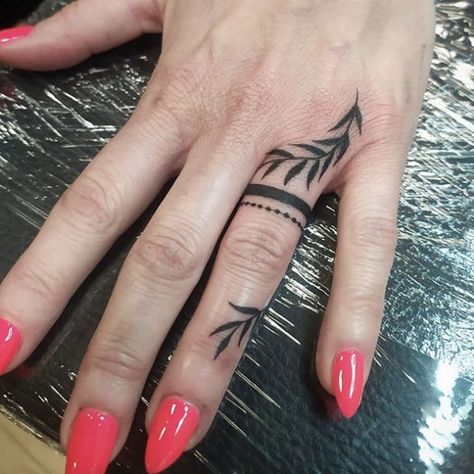 leaf wedding ring tattoo Women’s Ring Finger Tattoo, Wedding Ring Tattoos For Couples, Married Tattoos, Ring Tattoos For Couples, Wedding Ring Finger Tattoos, Wedding Ring Tattoos, Ring Tattoo Designs, Finger Tattoo Ideas, Wedding Band Tattoo