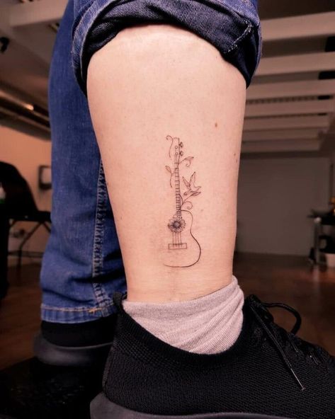 Small Guitar Tattoo, Under Skin Tattoo, Ukulele Tattoo, Guitar Tattoo Ideas, Small Music Tattoos, Borboleta Tattoo, Flower Of Life Tattoo, Guitar Tattoo Design, Small Guitar