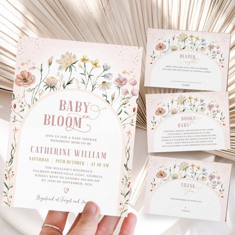 "Baby In Bloom Invitation Set This is a baby shower invitation template set that you can instantly edit, download and print yourself. This does not require any program or fonts to download. ✶ DEMO - TRY IT BEFORE YOU BUY IT - FREE! ✶ ------------------------------------------------------------- Copy and paste the link below into your web browser: https://www.corjl.com/d/506PI6 ✶ THIS LISTING INCLUDES  ✶ ------------------------------------------------------------- * A template for baby shower invitation card : 5\"x7\". * A template for a Diaper Raffle card : 3.5\"x5\". * A template for a Books for Baby card : 3.5\"x5\". * A template for a Thank You card : 3.5\"x5\". ✶ FILE TYPE ✶ ------------------------------------------------------------- After editing the document, you have the options Baby In Bloom Diaper Raffle, Baby In Bloom Invitation, Wildflower Baby Shower, Baby In Bloom, Baby Shower Invitation Cards, Baby Shower Templates, Baby Shower Invitation Template, Bloom Baby, Invitation Baby Shower