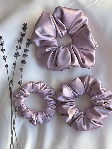 Lilac Satin scrunchies The cutest gift for the bride to be! Or a super thoughtful gift for your bridesmaids or a fun favor for your bachelorette party -Very Soft & comfortable -They are Gentle on the hair to prevent any creasing or breakage, frizz, ponytail bumps and split ends. - price is for one Hair Tye, Ponytail Bump, Bridesmaid Scrunchie, Bachelorette Party Hair, Purple Scrunchie, Long Bridal Hair, Oversized Scrunchie, Lavender Bridesmaid, Diy Hair Scrunchies