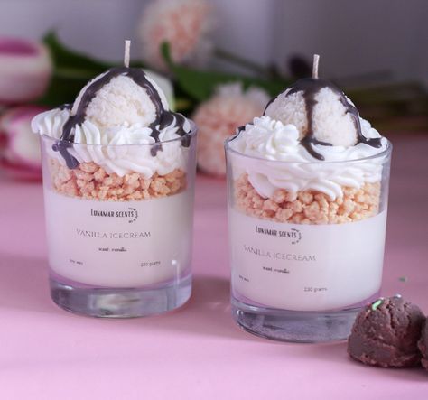 Elevate your space with our decadent Vanilla Dessert Candle! Hand-poured with precision, this luxurious 230g candle boasts layers of creamy white wax, tantalizing cookie crumbs, velvety whipped cream, and a delectable topping of vanilla ice cream drizzled with rich chocolate sauce. Enjoy the delightful aroma of vanilla wafting through your home as this candle burns for over 40 hours. Perfect for gifting to candle enthusiasts, dessert lovers, or anyone in need of a sweet-scented sanctuary. Gift S Icecream Candle, Desert Candles, Sundae Candles, Ice Cream Candle, Vanilla Dessert, Vanilla Desserts, Fudge Dessert, Dessert Candle, Chocolate Candle