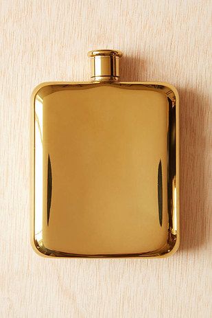 This 14-karat gold plated flask that will solidify your reign as the most glam gal around. | 21 Things You'll Want If You Love Being Fancy Gold Flask, Modern Bachelor Pad, Summer Travel Essentials, Liquor Flask, Hip Flask, Signature Cocktail, Fancy Pants, Bottle Design, Flask