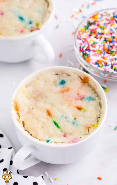 This Vanilla Mug Cake is a quick, easy dessert made in just minutes with simple ingredients. Perfect for satisfying sweet cravings fast! Diy Cake In A Mug, Quick Mug Cake Microwave Recipes, Sugar Cookie Mug Cake, Mug Cake Microwave Easy 3 Ingredients, Birthday Cake Mug Cake, Simple Mug Cake Recipe, Easy Mug Cake Recipe, Vanilla Mug Cake Recipe, 1 Minute Mug Cakes