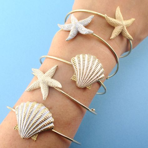 Channel your inner mermaid/ sea goddess with these beautiful sea inspired bangles!!!  Shop Online Today! 🌟🐚🐟  - -  #mermaidjewelry #bangles #seashellbracelet  #starfishbangle #starfishbracelet #mermaidbangle #oceanbangle #oceanbracelet #animaljewelry #dotoly #islandvibes Coastal Bracelet, Bangles Shop, Gold Bangle Bracelets, Bracelet Cuffs, Mermaid Accessories, Ocean Bracelet, Sea Goddess, Seashell Bracelet, Beach Jewelry Boho