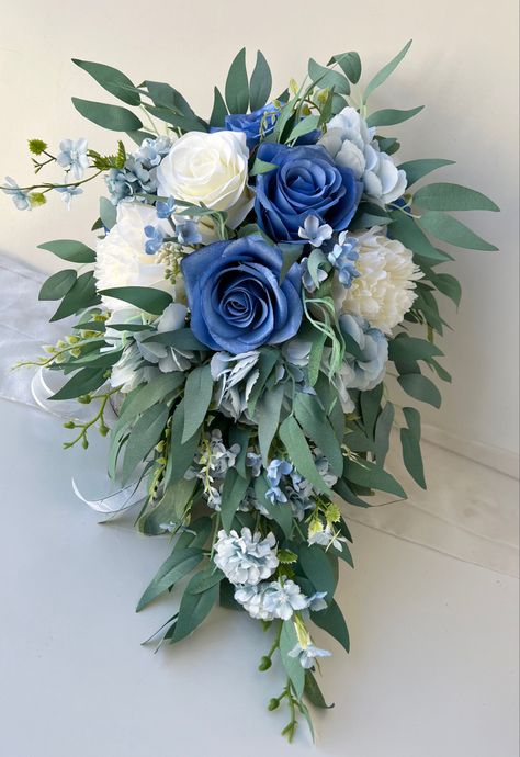 Waterfall Bouquet Wedding Blue, Eucalyptus Wedding Bouquet Cascading, Blue And White Cascading Bridal Bouquet, Blue Wedding Flower Arrangements, Blue Roses Bouquet, Eucalyptus Wedding Bouquet, White Rose Wedding Bouquet, Ivory Bouquet Wedding, Teardrop Bouquet