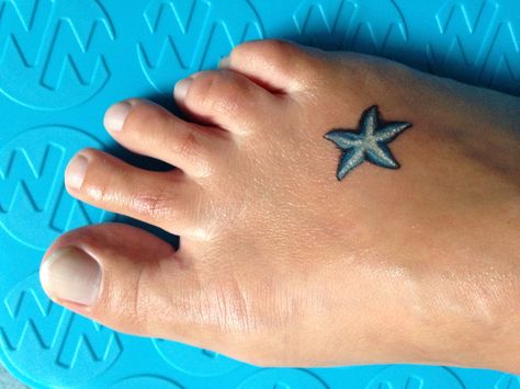 Small Starfish Tattoo Small Starfish Tattoo, Small Beach Tattoos, Beachy Tattoos, Starfish Tattoo, Small Foot Tattoos, Seashell Tattoos, Shell Tattoos, Foot Tattoos For Women, Theme Tattoo