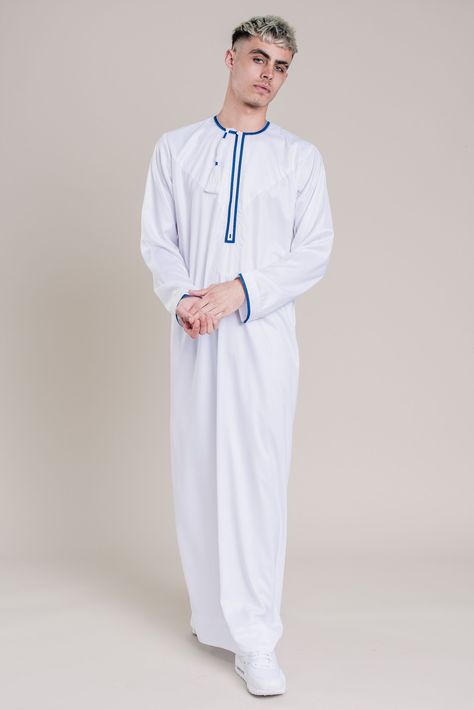 White & Blue Omani With Tassel Small restock in-store only #CaveThobes #Jubbas #Ramadan #Eid #Kandura Kanzu Wear, Jalabiya Dress, Muslim Men Clothing, Faisal Khan, Sweater Outfits Men, Man Clothes, Men's Kurta, Fabric Photography, Islamic Decor