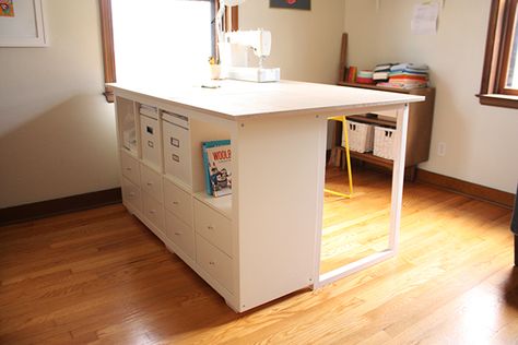 I want this set up - kallax cubicle with drawers - linnmon table top 29 1/2" wide. adjustable legs Sewing Cutting Table, Craft Room Tables, Sewing Desk, Sewing Room Inspiration, Hack Ikea, Ikea Expedit, Sewing Spaces, Sewing Room Design, Sewing Room Organization