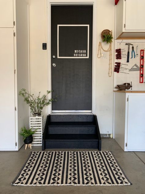 Super Easy and Inexpensive way to update your garage door.  Black and White Modern Home Design, DIY projects for the home, Mom Blog, Home Decor Blog, DIY Accent Door, DIY Paint Projects, Project Whim, Interior Design, #homedecor #diyprojects #diyhomedecor #diy #momblog #blogger #garagegoals #blackandwhitedecor #modernhomedecor #modernhome #paint #blackdoors #accentwall #accentdoor White Garage Interior, Garage Door Black, Door Black And White, Garage Door Update, Black And White Door, Modern Garage Door, Door Update, Garage Steps, Garage Entryway