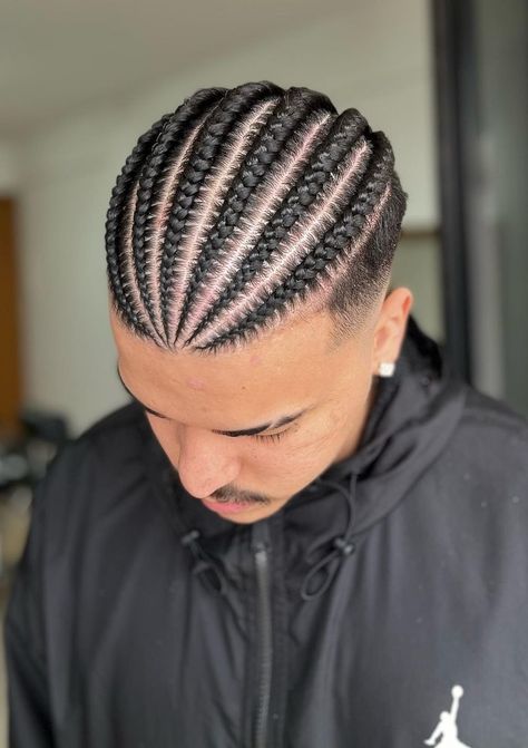 Faded cornrows are one of the most popular styles, ideal if you’re growing out the top portion of your hair. Make sure to keep your hair conditioned by using hair conditioners for men. Men’s Cornrows Fade, Braids For Men Curly Hair, Fade Cornrows Men, Cornrow Hairstyles On Men, Faded Cornrows Men, Men’s Braids Top, Short Hair Men Braid Styles, Braids For Men 4c Hair, Cornrow Hairstyles For Black Man