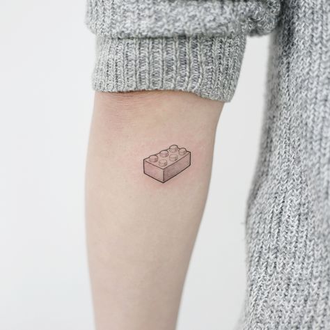 Tattooist_Doy on Instagram: “: Lego .” Small Side Tattoos, Tattoos Hip, Lego Tattoo, Small Simple Tattoos, Lower Belly Tattoos, Small Girly Tattoos, Belly Tattoos, Hip Tattoos, Lower Stomach