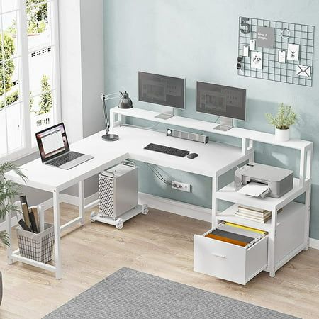 "Specification: Color: White Room Type: Office Shape: L-Shape Brand: ADORNEVE Max Loading Capacity:300lbs Desk design: Computer Desk Product Dimensions: 66.99\"D x 19.6\"W x 34.6\"H Top Material Type: Engineered Wood Mounting Type: Tabletop Material: P2 Particle Board+ Metal Frame Overall Dimension: 66.9\"L x 51.2\"L x 34.8\"H Desktop Dimension: 47.2\"L x 19.6\"W, 31.5\"L x 15.7\"W Monitor Riser Dimension: 66.9\"L x 5.9\"W x 5.9\"H Printer Cabinet Dimension: 19.6\"L x 19.6\"W Letter Size Drawer Computer Table With Printer Space, White Corner Desk Setup, L Shape Study Table Design Bedroom, L Shape Table, Family Organisation, Bedroom Desk Chair, White L Shaped Desk, Corner Desk With Storage, White Corner Desk