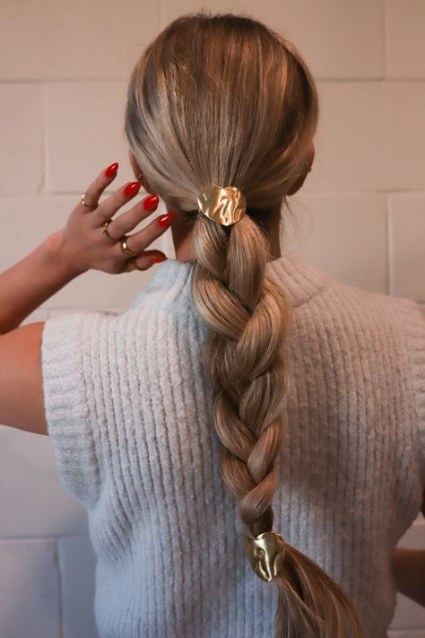 This hammered heart cuff is the beautiful touch to any ponytail! The L Shape hook will slide into any ponytail and sit securely. Comes in silver and gold. It adds that extra flair to any fancy outfit, but also levels up any casual outfit. 1.x5x1.5 inches. Gold Jewelry Casual Outfit, Gold Ponytail Cuff, Hair Styles With Accessories, Heart Ponytail, Ponytail Ribbon, Hair Cuff, Fancy Outfit, Hair Cuffs, Bridal Hair Updo