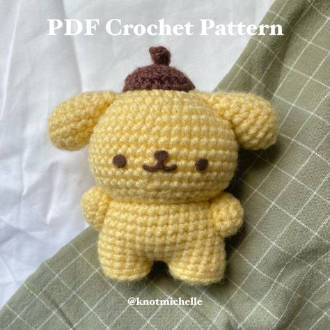 This is a PDF crochet pattern, not a finished product! A 9 page PDF file, including the title page, step-by-step instructions, notes, and pictures to make a yellow pup. Beginner friendly crochet pattern to make your very own yellow pup! The pattern is written in English and uses US terminology. Materials: Worsted weight yarn (size 4) in yellow and brown 3.75mm hook brown felt or whatever you desire to make the face with Glue or any adhesive to attach the face Polyfil / Fibrefil Stitch marker (op Easy Things To Crochet, Unique Tools, Easy Crochet Animals, Crochet Mignon, Confection Au Crochet, Knit Projects, Crochet Design Pattern, Kawaii Crochet, Crochet Things