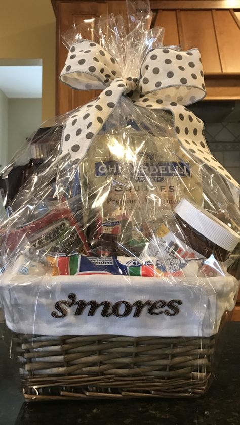 s'mores basket Smores Basket Ideas For Raffle, S’mores Basket, Smores Basket, Pumpkin Pie Martini, Smores Kits, Raffle Basket, Raffle Baskets, Small Basket, Christmas Baskets