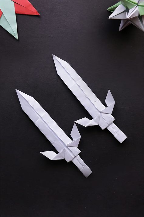 We will make Easy Origami Sword today.  Please SUBSCRIBE to our channel, we'll be posting more videos soon.  #origami #sword #ninja #arts #crafts #diy #artandcrafts #papermade #doityourself #paperfolding #origamieasy Dnd Origami, Paper Swords Craft, Origami Knife, Dragon Origami, Paper Room Decor, Origami Easy Step By Step, Star Wars Origami, Origami Leaves, Origami Diamond