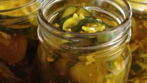 Cucumber slices, onions, peppers and garlic are pickled in an exciting spicy cider vinegar mixture! What a great way to end the summer! Bread N Butter Pickle Recipe, Making Pickles, Homemade Pickles Dill, Sour Pickles, Pickled Cucumbers, Lime Pickles, Best Pickles, Pickles Recipe, Pickle Butter