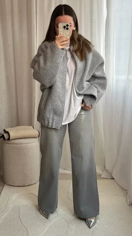 All about the greys and silvers for the winter days 🤍🖤 Grey wool coat | Borg oversized bomber jacket || Heart earrings | Bow phone case | Monica Vinader rings | Winter outfit ideas | Silver coated jeans | All grey outfit idea #LTKover40 #LTKstyletip #LTKworkwear Grey Wide Leg Jeans Outfit, All Grey Outfit, Grey Jacket Outfit, Silver Trousers, Grey Outfits, Grey Wool Coat, Bow Phone Case, Silver Aesthetic, Wide Leg Jeans Outfit