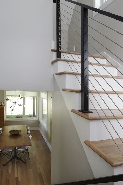 Cable Railing Staircase Interior, Staircase Cable Railing Design, Metal Cable Railings Indoor, Staircase With Cable Railing, Stair Cable Railing Ideas, Modern Cable Stair Railing, Indoor Cable Railings For Stairs, Metal Cable Stair Railing, Modern Stairway Railing