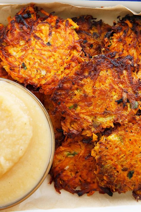 These Sweet Potato Latkes are a healthier, gluten-free version of classic potato latkes. They’re made with shredded sweet potato, flavored with onions and scallions, and fried to crispy perfection! Shredded Sweet Potato, Sweet Potato Latkes, Kitchen Website, Vegetarian Burgers, Sweet Potato Fritters, Lexi's Clean Kitchen, Clean Eating Guide, Gluten Free Sweet Potato, Potato Latkes