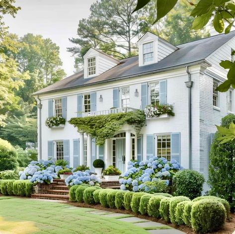 #whitepicketfence #fenceideas #homedecor #outdoorliving #landscaping #curbappeal #gardeninspiration #timelesselegance #homeinspo #picketfence White House With Blue Shutters, Colonial House Exteriors, Blue Shutters, Colonial Exterior, Dream Life House, Up House, Southern Home, House Exteriors, Dream House Interior